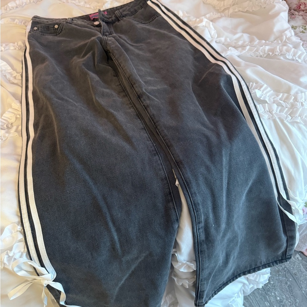 Edikted size small jeans with string bow at the end should fit a size 25-27